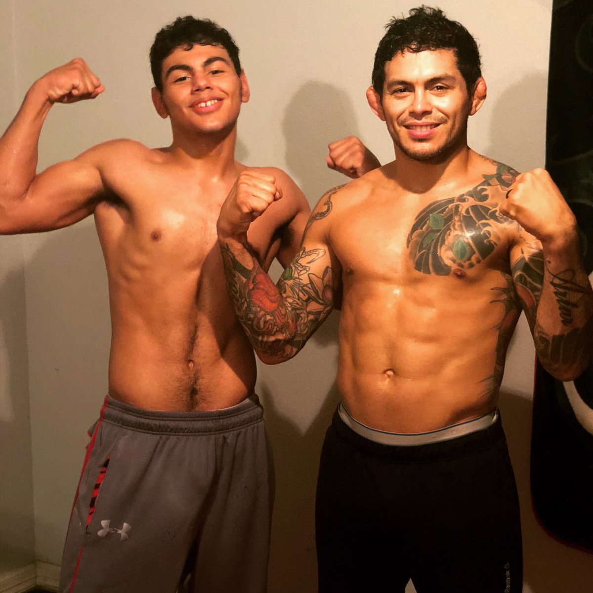 DiegoUFCTX's tweet photo. Best friend and my older son helping me putting extra training at house #God #family #fighter #ufc #boxing #mma #muiythai #wrestling #weightlifting https://t.co/238NVzDo8u