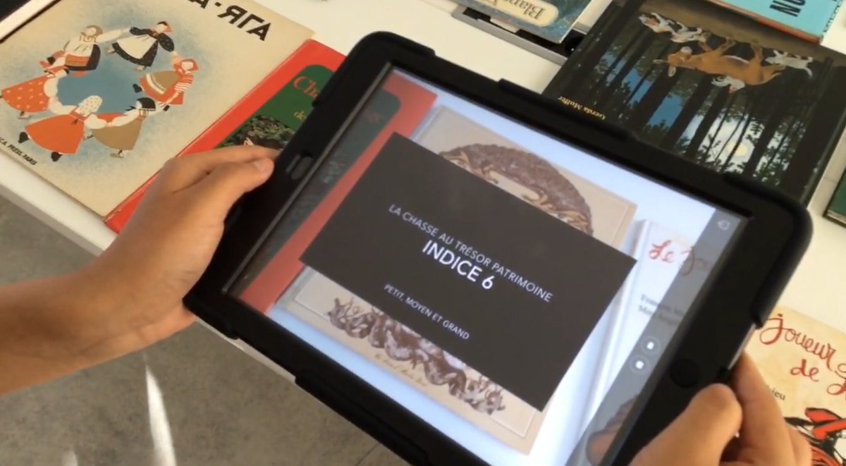 CAvdjian's tweet photo. Cette édition #HackathonBnF fut aussi l’occasion de faire découvrir des projets réalisés en réalité augmentée par le médiathèque Françoise Sagan. Valorisation du fonds Patrimoine, chasse au trésor numérique ou encore visite interactive... #bib2paris #aurasma @hpreveal https://t.co/HLjKQBa8Jz