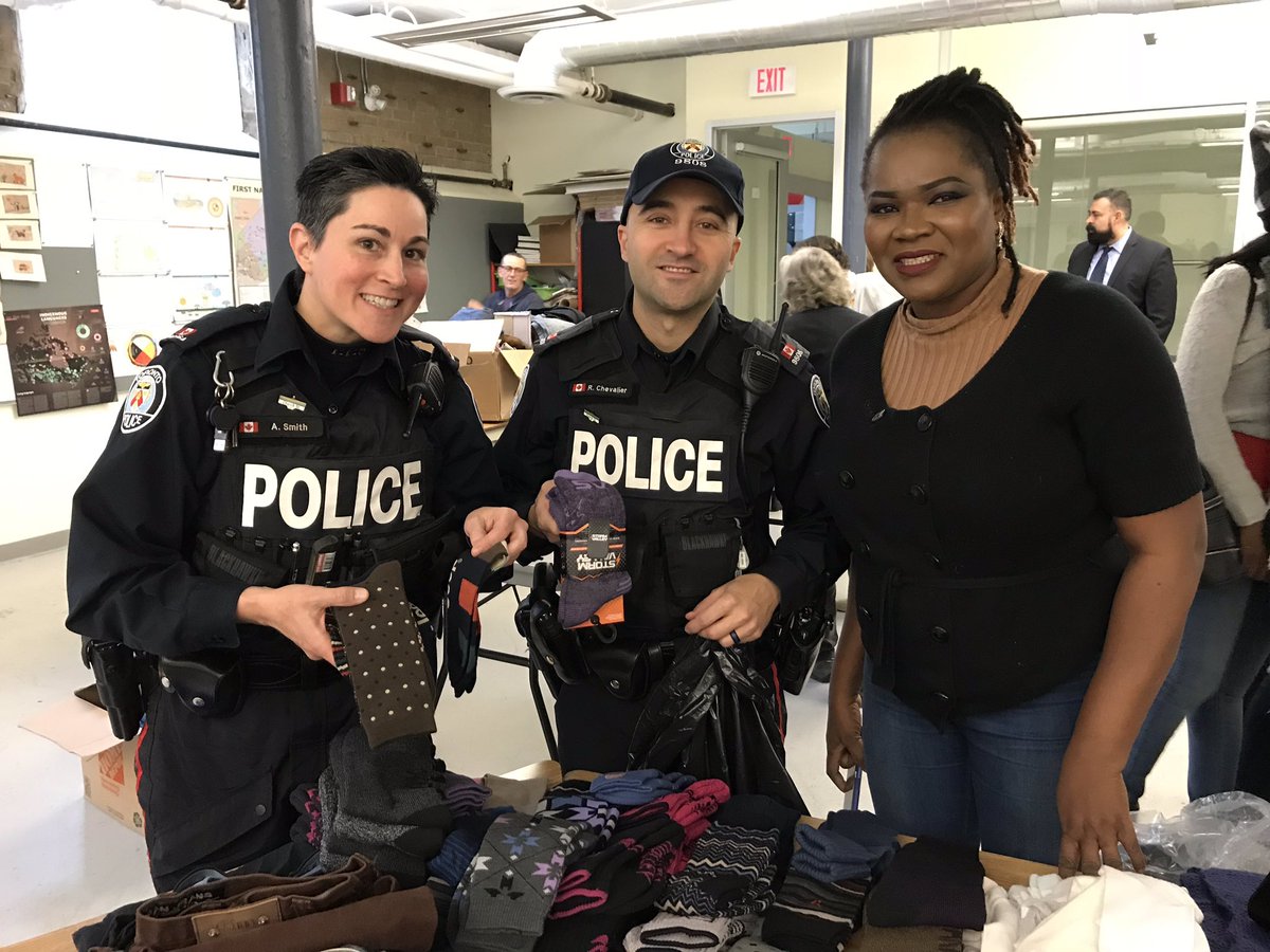 LGBTQISN's tweet photo. We didn’t come empty-handed today to @mcctoronto #newcomer support group. Our members donated bags of warm clothes, footwear &amp; toys for kids. #CopsWhoCare #WeSupportYou https://t.co/8wJVFVTzWk