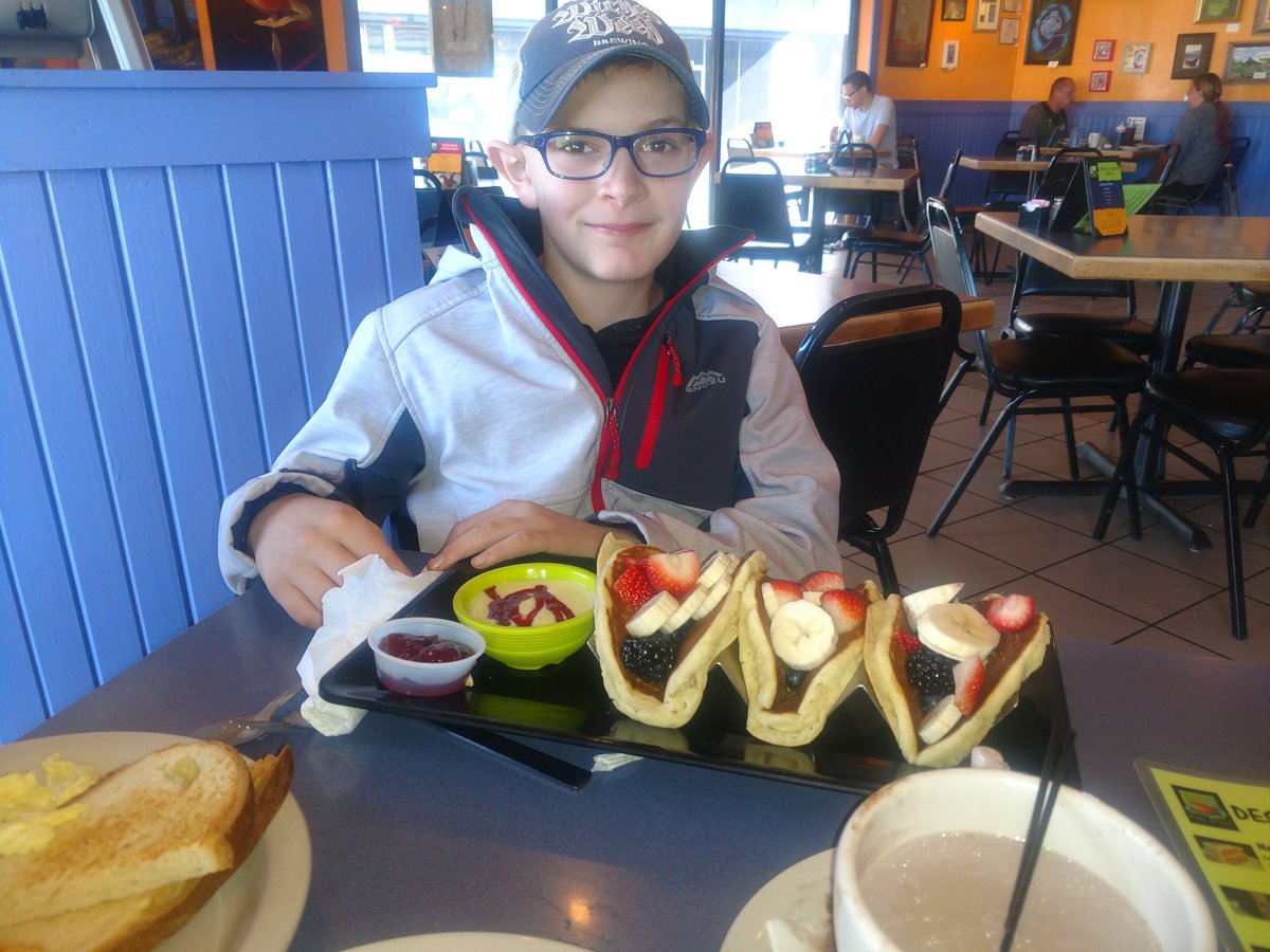 JasonAgee4's tweet photo. Breakfast in Dallas @CafeBrazil  two days ago. Who wouldn't love some pancake tacos??? They were awesome. We'll, at least the half of one that was left after Nolan devoured them. https://t.co/Ckbjz9LSwi