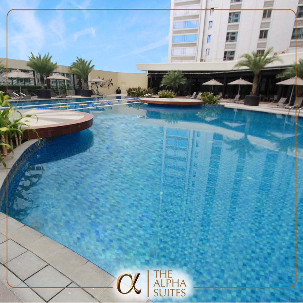 TheAlphaSuites's tweet photo. A dip in The City Club’s lagoon-shaped swimming pool is the perfect escape whether you’re doing laps solo or swimming with your family and friends. https://t.co/EeHJ60OkLo