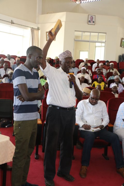 NLC_Kenya's tweet photo. A resident takes an oath before his submission during a public hearing on land matters at Matuga KSG https://t.co/gOHLJgCucK