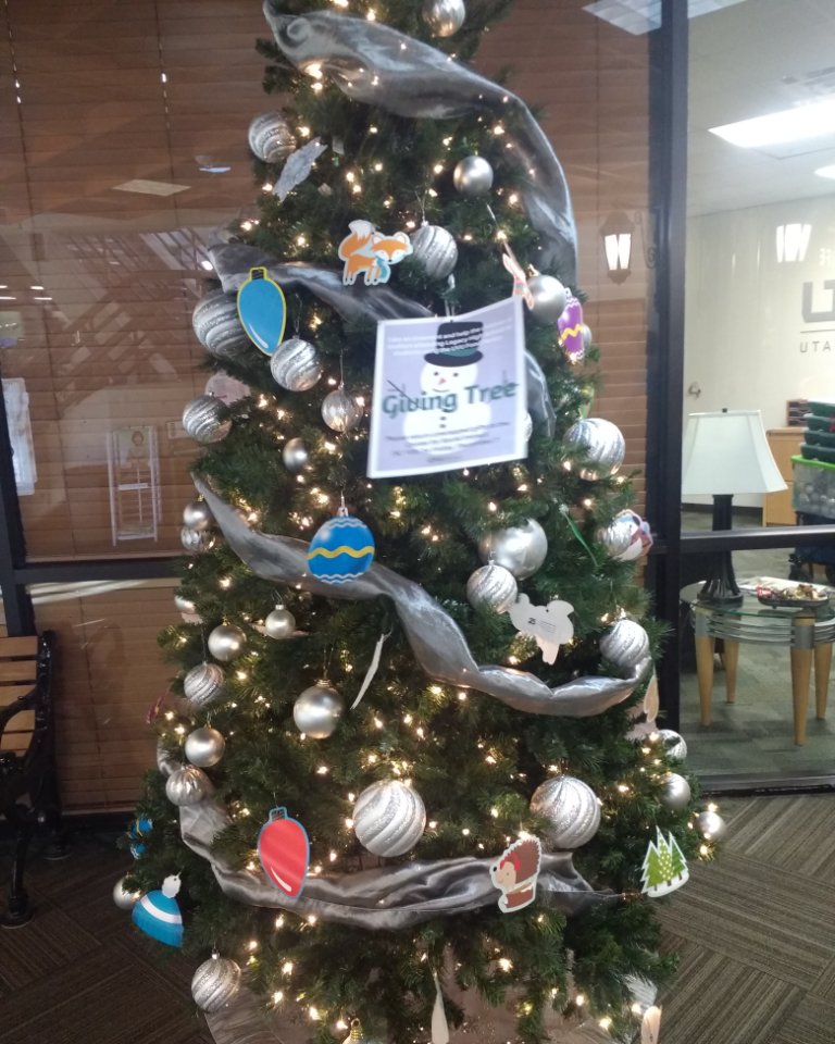 UVUWSC's tweet image. Are you looking for a good way to give back this year? This giving tree is just outside the lower level of the food court next to the Student Affairs office. It's simple to give. Take a tag from the tree, buy the item listed &amp;amp; return it to the Center for Social Impact by Dec. 7!