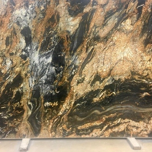 Isn't this #MagmaGoldGranite so unique? Let's talk about updating your #kitchen before the holidays. Call us for availability and similar options! 410-626-2025 #InHomeStone