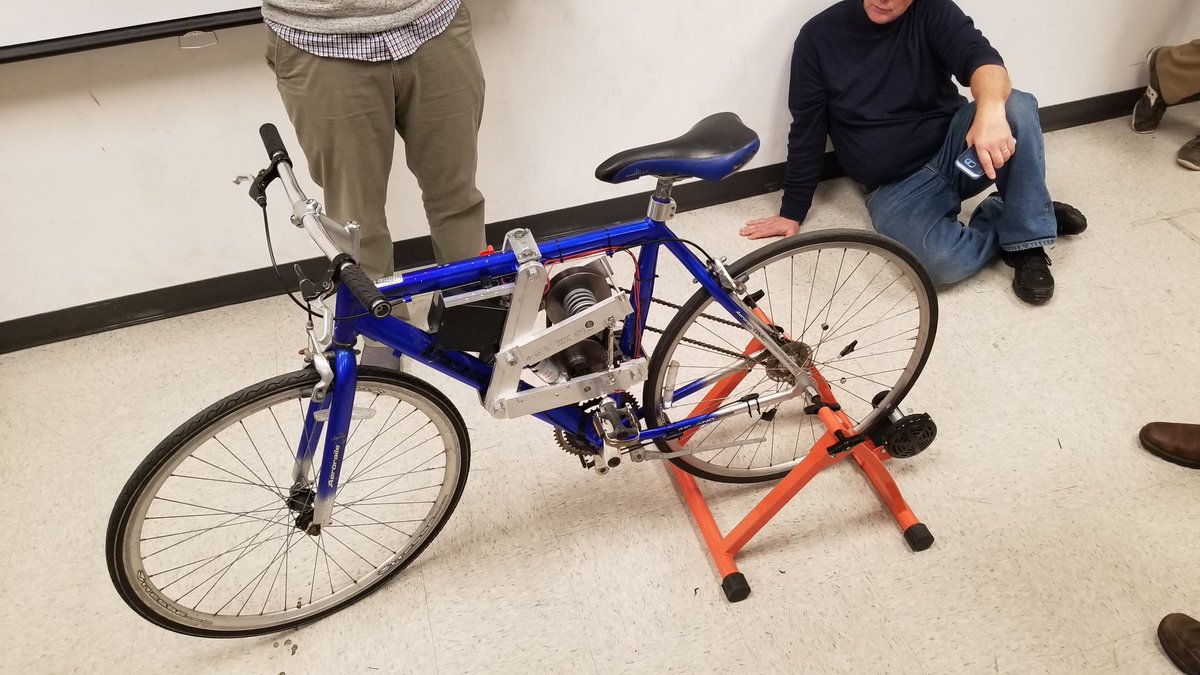 RussellMarzette's tweet photo. Its #CapstoneDesign time again! Our @OhioStateMAE ME students delivering their successful functional demo of a custom automatic transmission for a bicycle. Uses a v-belt drive system with an adjustable sheave to automatically maintain the riders desired cadence. Fun to ride! https://t.co/e5CNFSAZAq