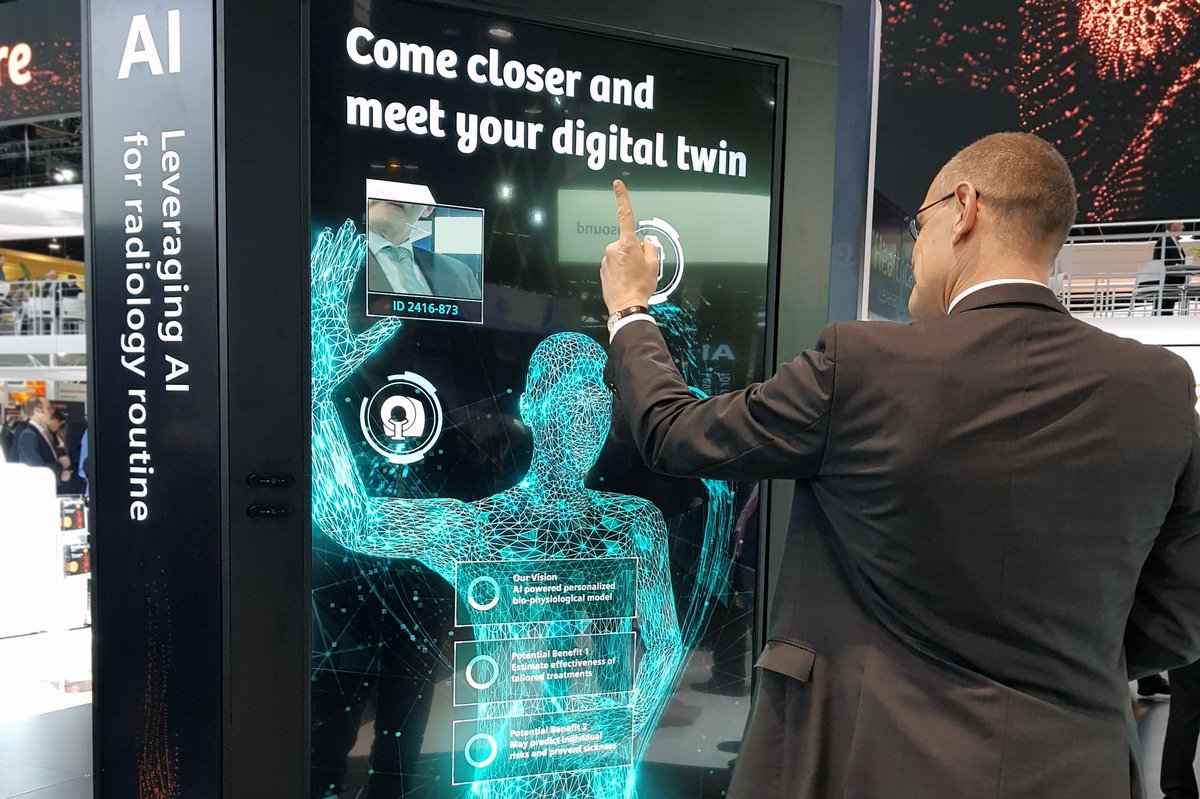 bernd_montag's tweet photo. Meeting my digital twin at our @SiemensHealth booth 😉 #RSNA18 https://t.co/JmksNYV2NF