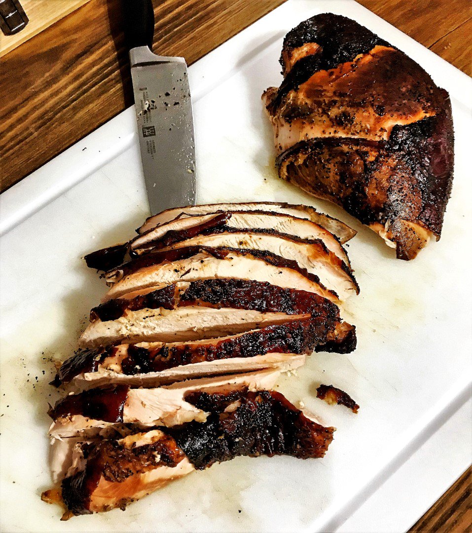 BaasPro's tweet photo. Smoke-Roasted Turkey Breast for Friendsgiving 2018. The @WeberGrills kettles are perfect for smoking and perfect turkey. Low temps to get some smoke for awhile, then just crank the vents to finish cooking and crisp the skin. I've never even put one in the WSM. #robsgrill https://t.co/P469cyyTIw