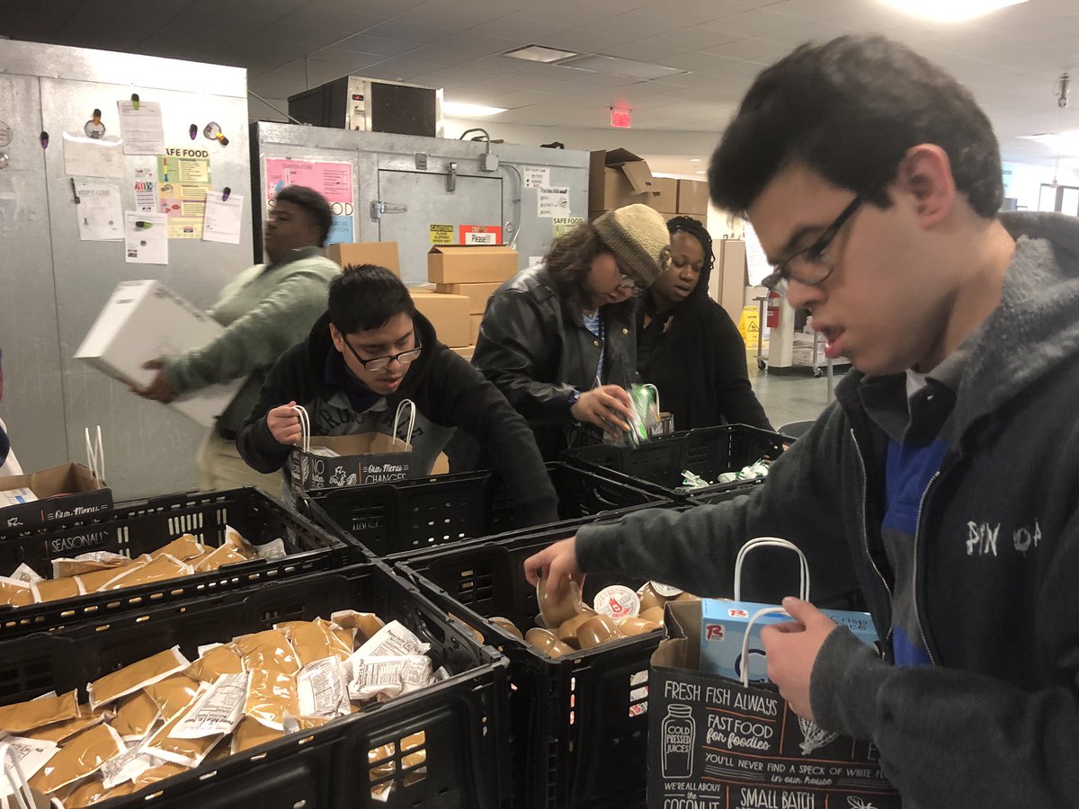 Working hard making breakfast bags!