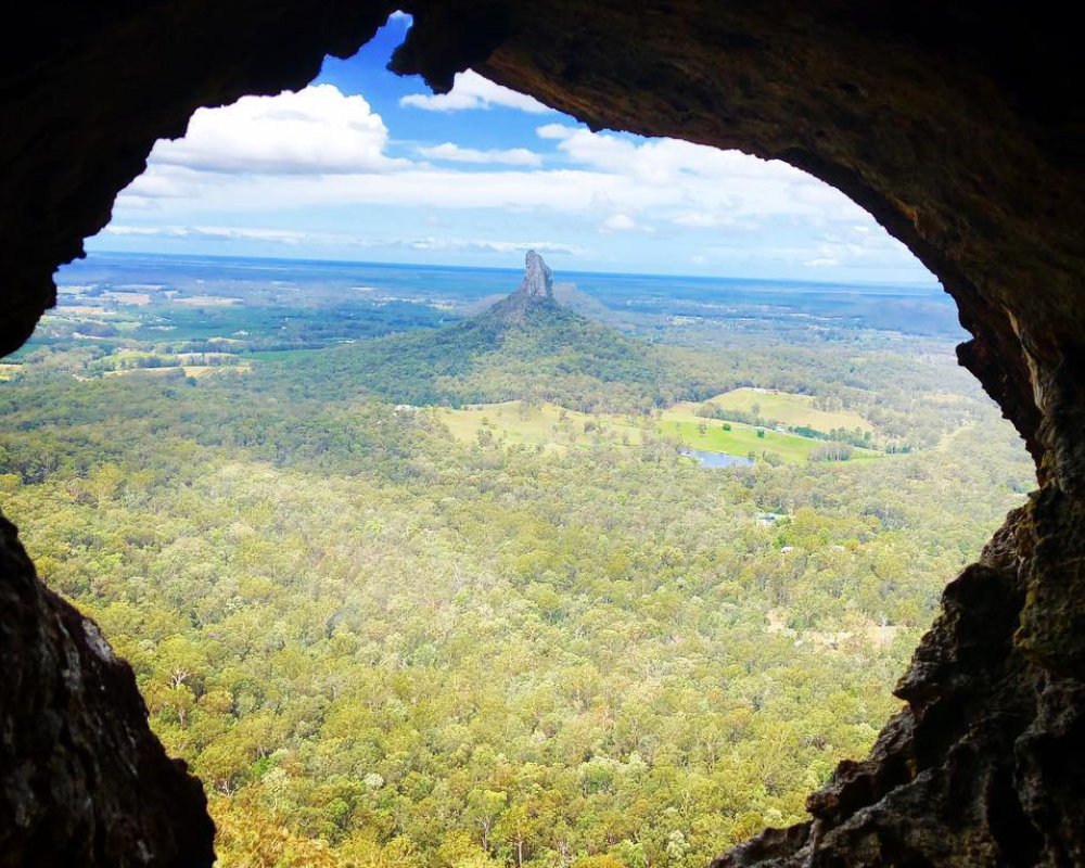 Australia's tweet photo. Friendly reminder to get out of your cave once in a while 👀⛰️ 

(via IG/emmgoeshiking in @queensland’s #GlasshouseMountain NationalPark)  #seeaustralia https://t.co/2CAubflvLU