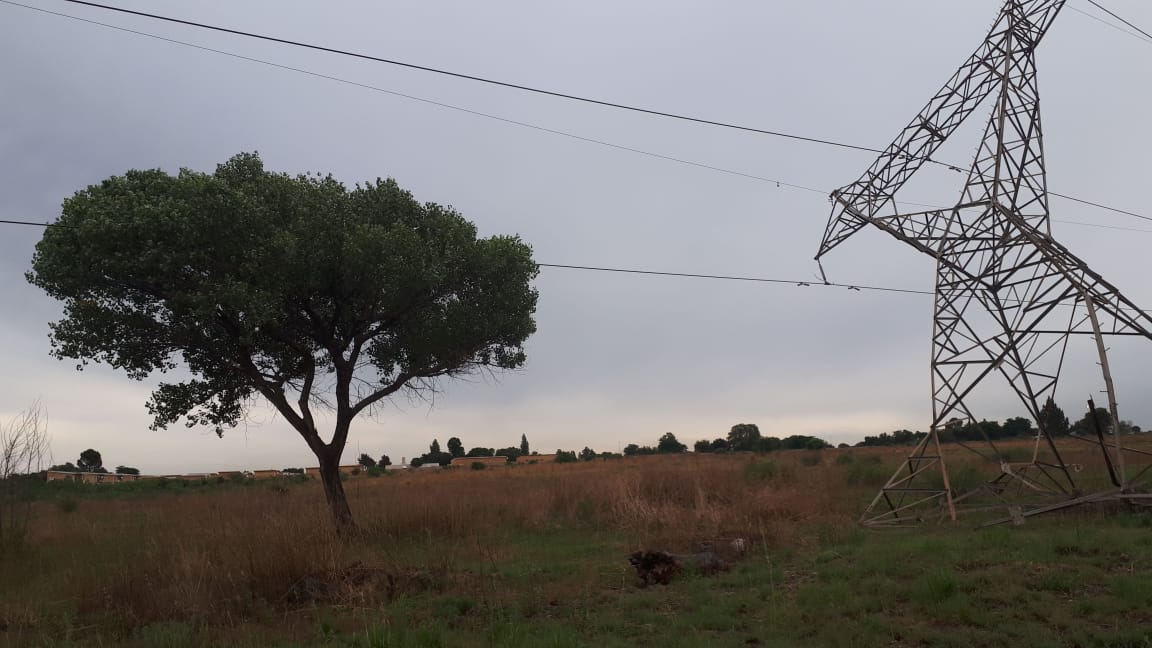 Eclectic_Energy's tweet photo. Will this be fixed before someone dies? The power lines are hanging so low over the road, a truck will strike it soon. Looters have already started plundering. #Eskom #Emfuleni https://t.co/X4J6nCqbXv