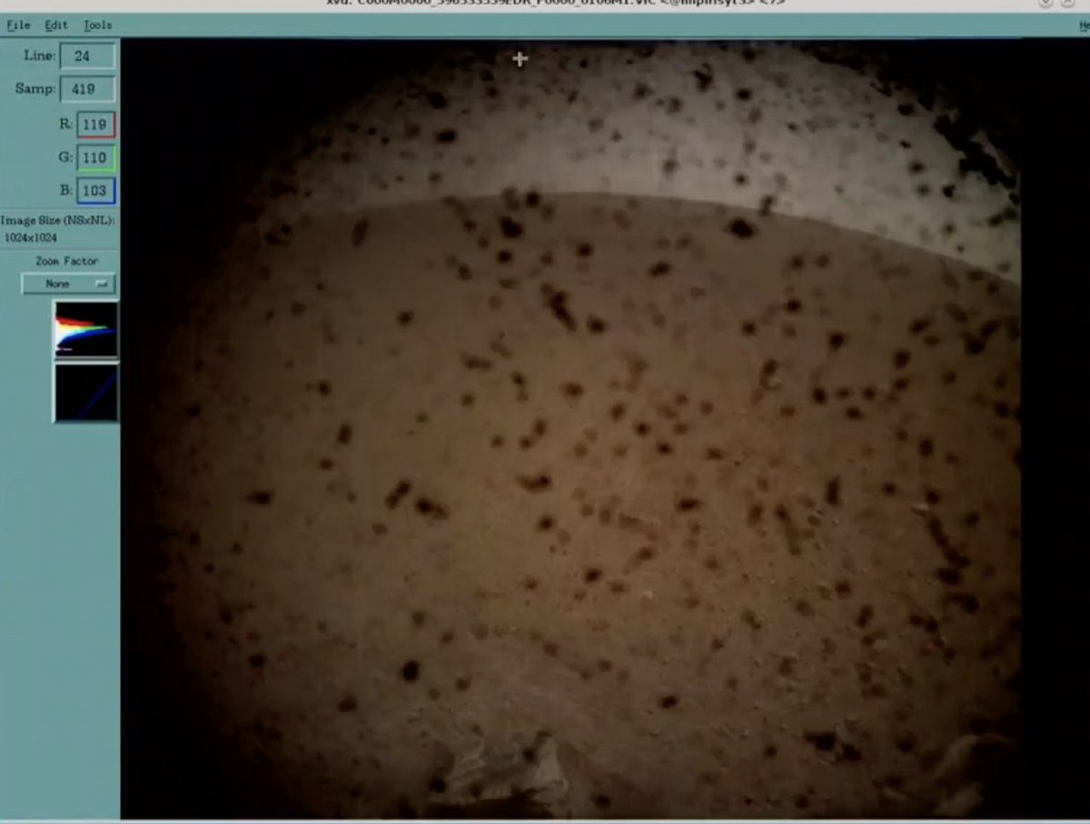 First photo from InSight!  It's dirty from the dust it kicked up during landing (this will get cleared off later).