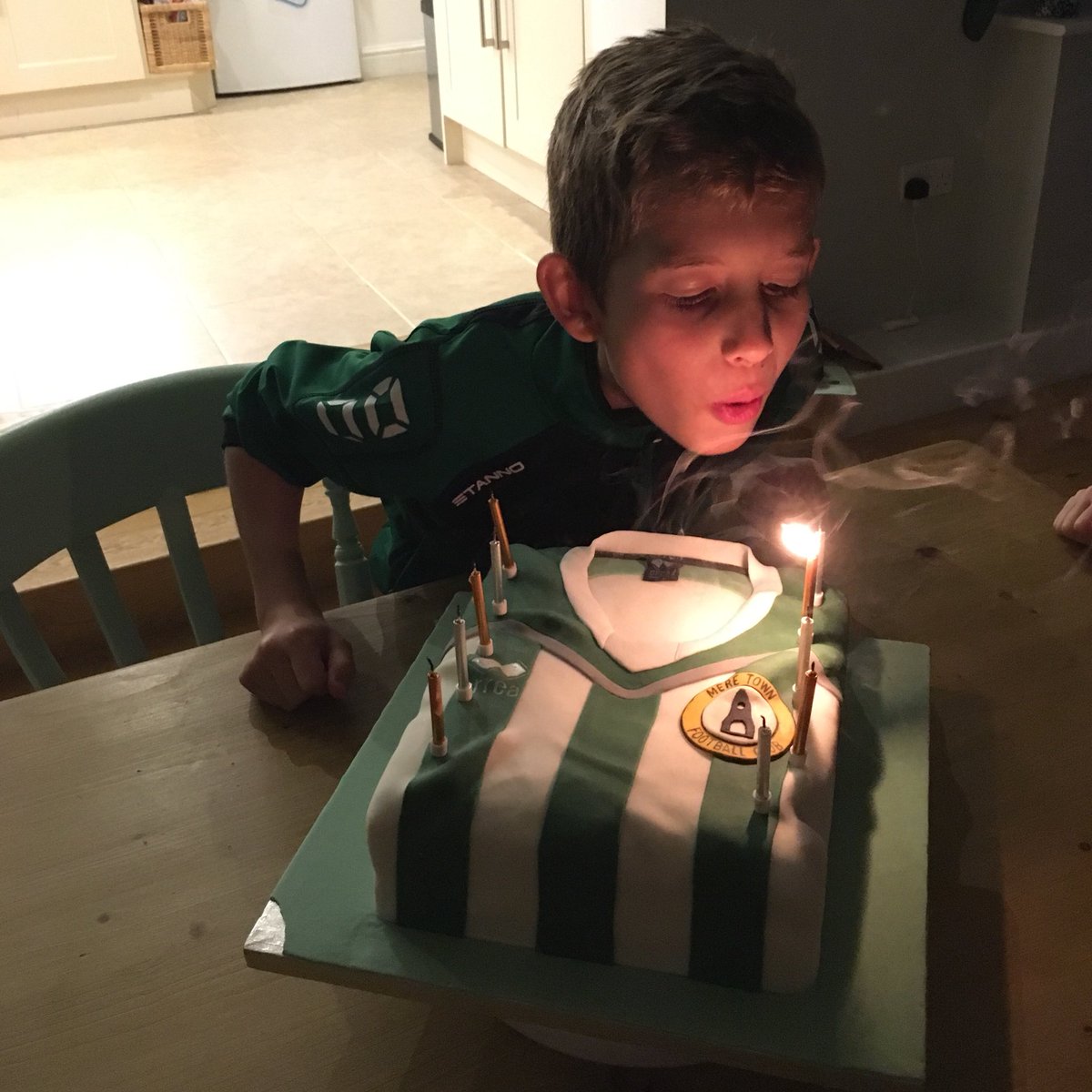 lor_beth's tweet photo. The Boy is now in double figures. 10! #cake #birthdaycake #football #footballcake #footballshirt #footballshirtcake #MTYFC #merewiltshire #sugarpaste #fondant #mereclocktower #errea https://t.co/Aq6UZemmB4