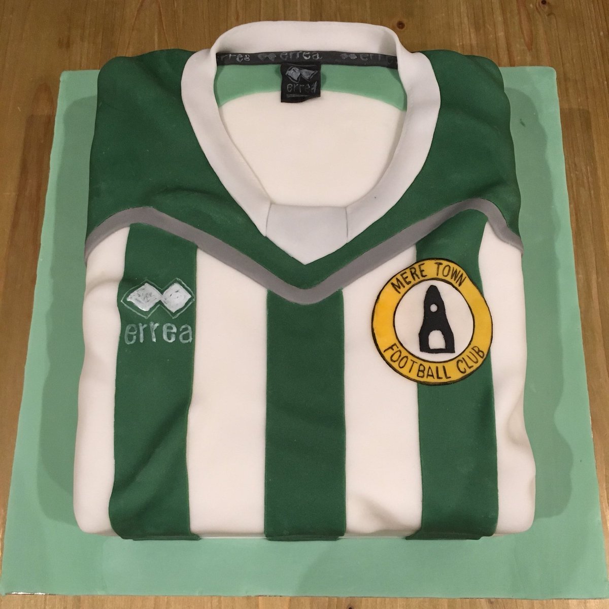 lor_beth's tweet photo. The Boy is now in double figures. 10! #cake #birthdaycake #football #footballcake #footballshirt #footballshirtcake #MTYFC #merewiltshire #sugarpaste #fondant #mereclocktower #errea https://t.co/Aq6UZemmB4