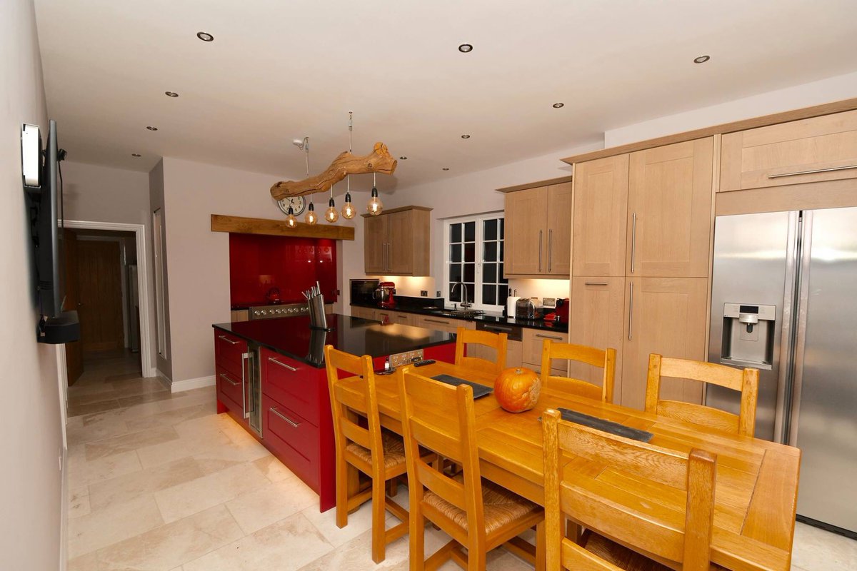 SarahJaneKit's tweet photo. Say hello to the Broadoak Kitchen from our Second Nature Kitchens range with Broadoak Painted Island in Garnet Symphony 3 as specified by the client.  Granite worktops in Premium Black with Upstands and Painted Glass Hob Splashback to compliment the island. https://t.co/815M5Qenyp
