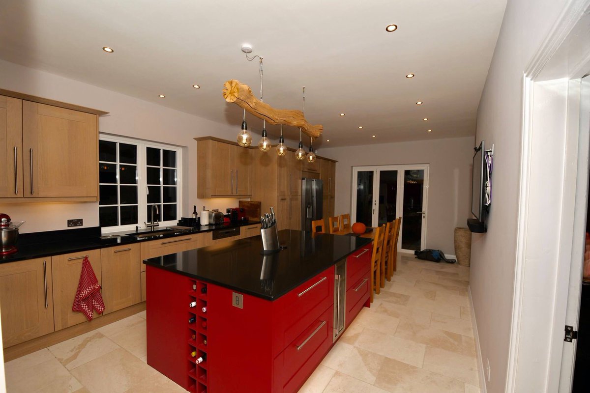 SarahJaneKit's tweet photo. Say hello to the Broadoak Kitchen from our Second Nature Kitchens range with Broadoak Painted Island in Garnet Symphony 3 as specified by the client.  Granite worktops in Premium Black with Upstands and Painted Glass Hob Splashback to compliment the island. https://t.co/815M5Qenyp