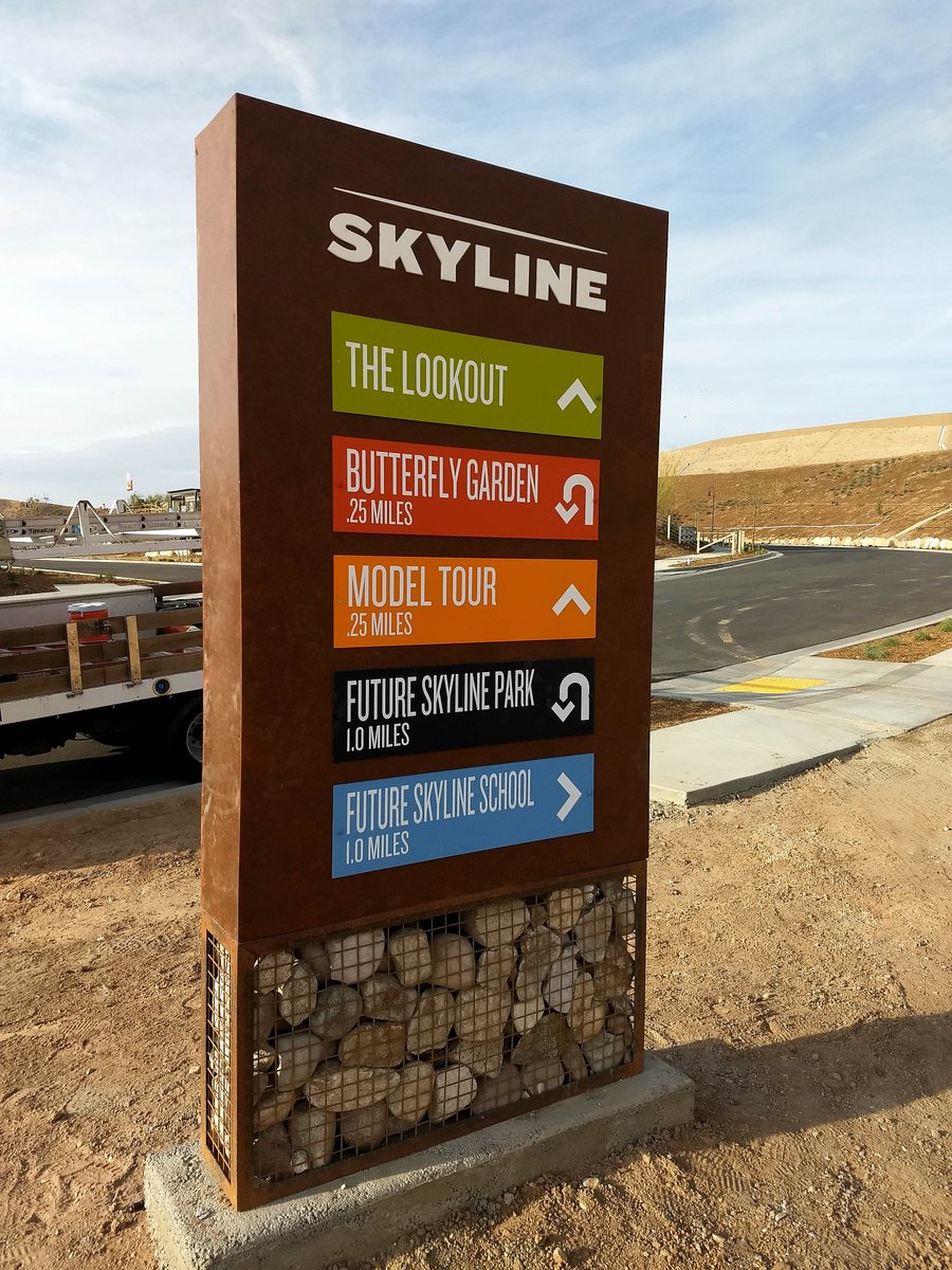 OutdoorDimsigns's tweet photo. The neighborhood kiosk program at Skyline for @PardeeHomes are aluminum cans with a natural rust faux finish structures mounted on gabion mesh baskets and are such striking signs! Loving the pops of color. π¨#ODteamwork https://t.co/qmoKUmPGEI