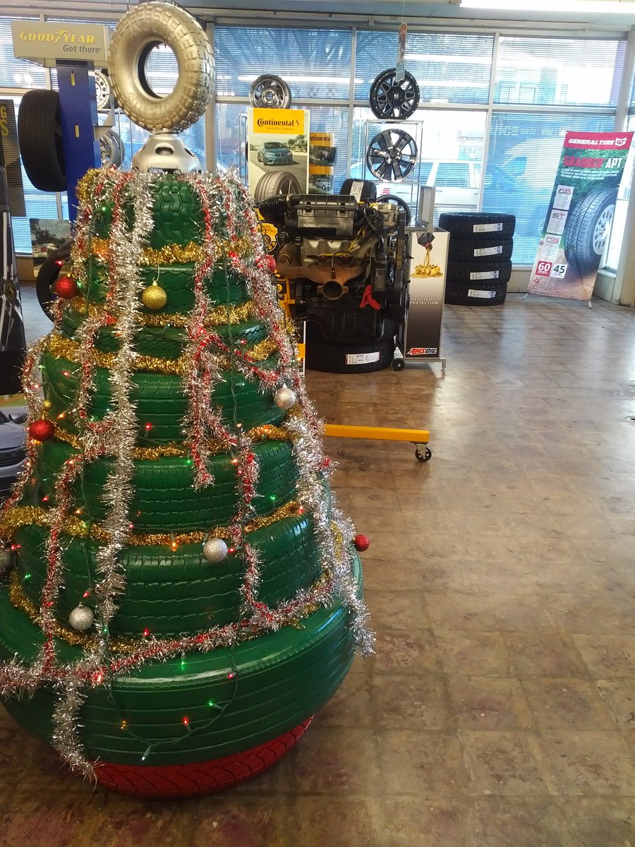 PatsTireAndAuto's tweet photo. This is what happens when you ask the guys to trim the tree #goodjob #autoshoplife #ChristmasTree https://t.co/iNVpzWdZJb