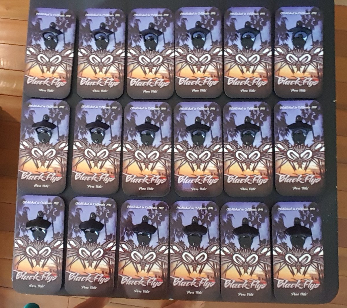 Check out these <a href="/blackflysusa/">Black Flys Eyewear</a> branded Pop N Caps bottle openers!   Cool design.