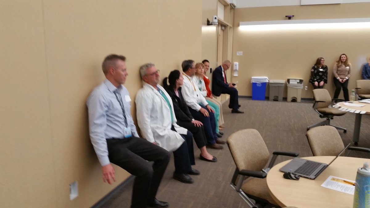 KeiNakagawaMD's tweet photo. @UCDavisHealth faculty, residents, and staff 'sitting the talk' on #physicianburnout at the #PhysicianHealth and #Wellbeing Summit. #WallSits led by #EmergencyMedicine faculty @katren_tyler! #QuadrupleAim @PeterYellowlees @dlubarskymd @Chancellor_May @UCDavisMed @ucdavis https://t.co/qTWJfKrgQZ