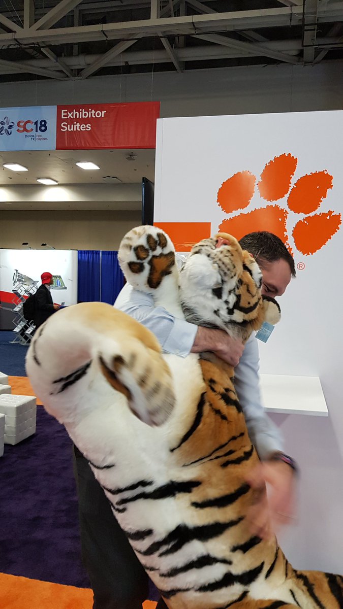 therealdoolah's tweet photo. Taking down and wrestling with the (now incapacitated)
Clemson tiger at Supercomputing 18 #ClemsonSC18 https://t.co/POwyZVFqc5