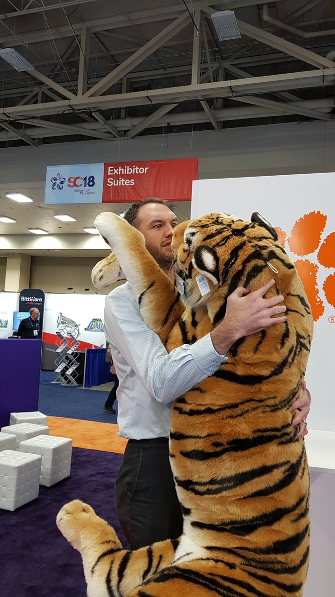 therealdoolah's tweet photo. Taking down and wrestling with the (now incapacitated)
Clemson tiger at Supercomputing 18 #ClemsonSC18 https://t.co/POwyZVFqc5
