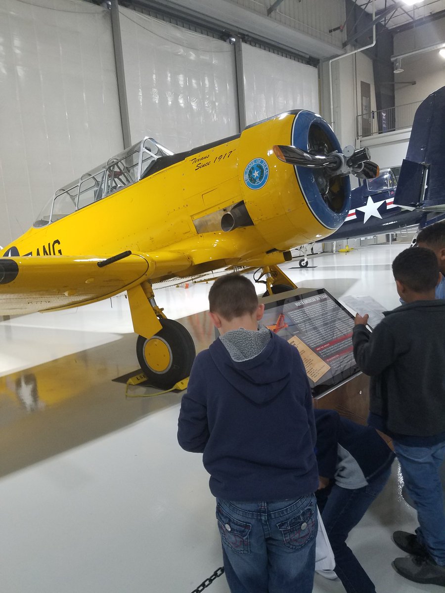 love2vaca's tweet photo. A student was so inspired by the Lone Star Flight Museum field trip he brought his plane from WWII to school for show and tell. #hregamechanger https://t.co/YmiW58vlGL