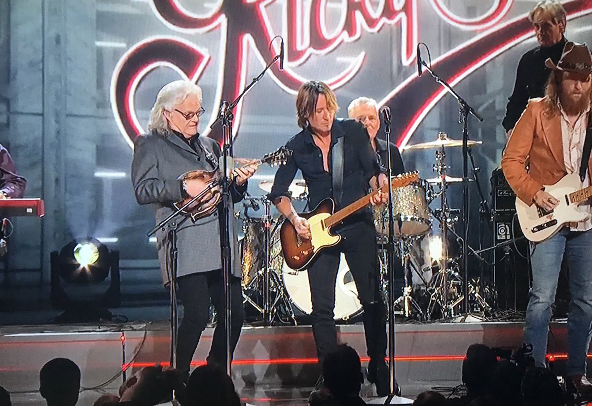 opry's tweet photo. Excuse us while we lose our MINDS over that epic #CMAawards collaboration honoring #OpryMember @RickySkaggs! 🤯 @KeithUrban @BradPaisley @martystuarthq https://t.co/PZIBNB7fSl