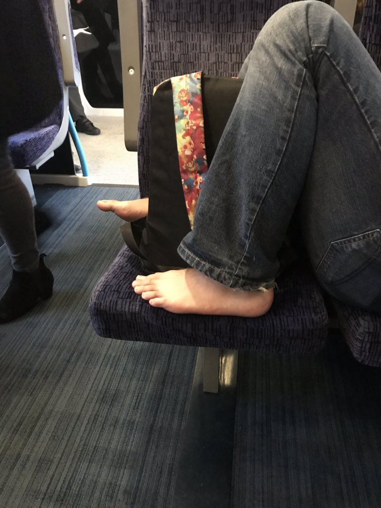 ajmillins's tweet photo. NOTE TO ALL TRAIN PASSENGERS: travelling like this instantly makes you an arsehole. Also, get your toenails cut. #trains #passengers #southeastern #trainpassengers #passengersfromhell #thisismyworstnightmare #someonesaveme #thereisvomitinmymouth https://t.co/cCrkfia4Ta