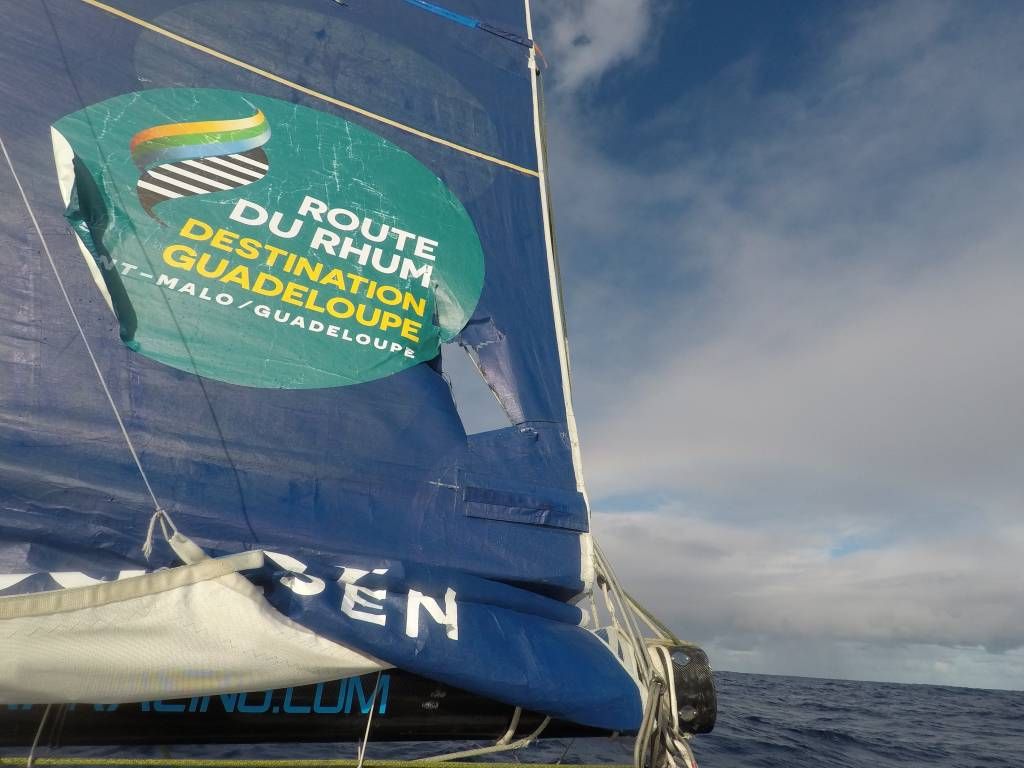 OceansLab_'s tweet photo. After 20,000nm of racing, signs of mainsail fatigue are beginning to show with the opening of a hole in the lower section, which, ironically occurred yesterday when Phil achieved the best Class40 performance over 24hrs covering 251.5nm at an average speed of 10.5 kts 💪 #RDR2018 https://t.co/LcOvLsAoPR