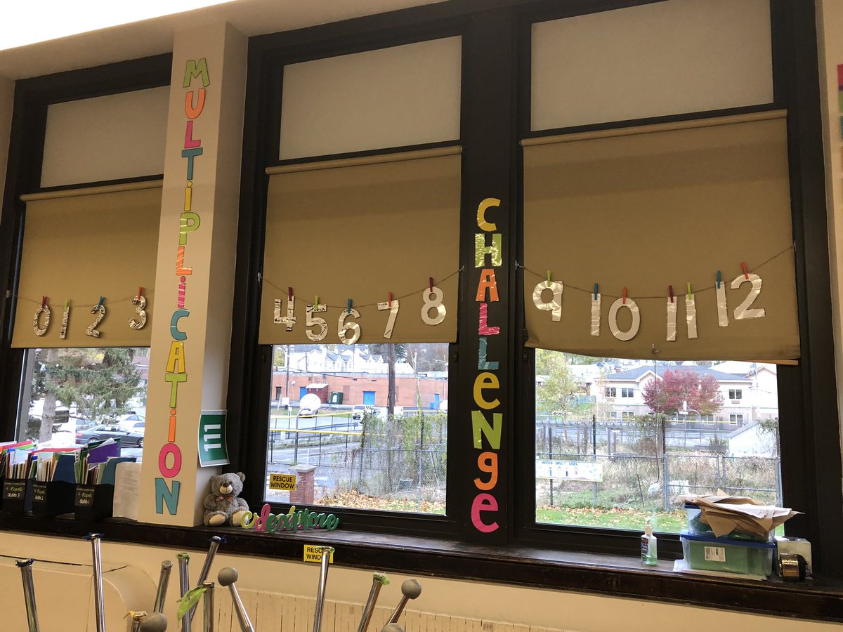 Our challenge wall motivates students to master their multiplication facts 1-12. So many students have signed their names on the numbers already!  #nrnt18 #NRCSDchat
