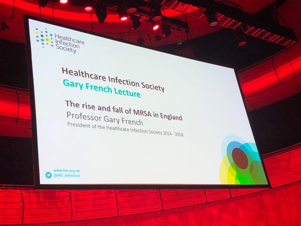 DrGLMarsden's tweet photo. Our President, Prof Gary French, discusses the rise and fall of MRSA in England in the inaugural Gary French lecture #fisnov18 @FISNov2018 https://t.co/DH4Kc9Qqx2
