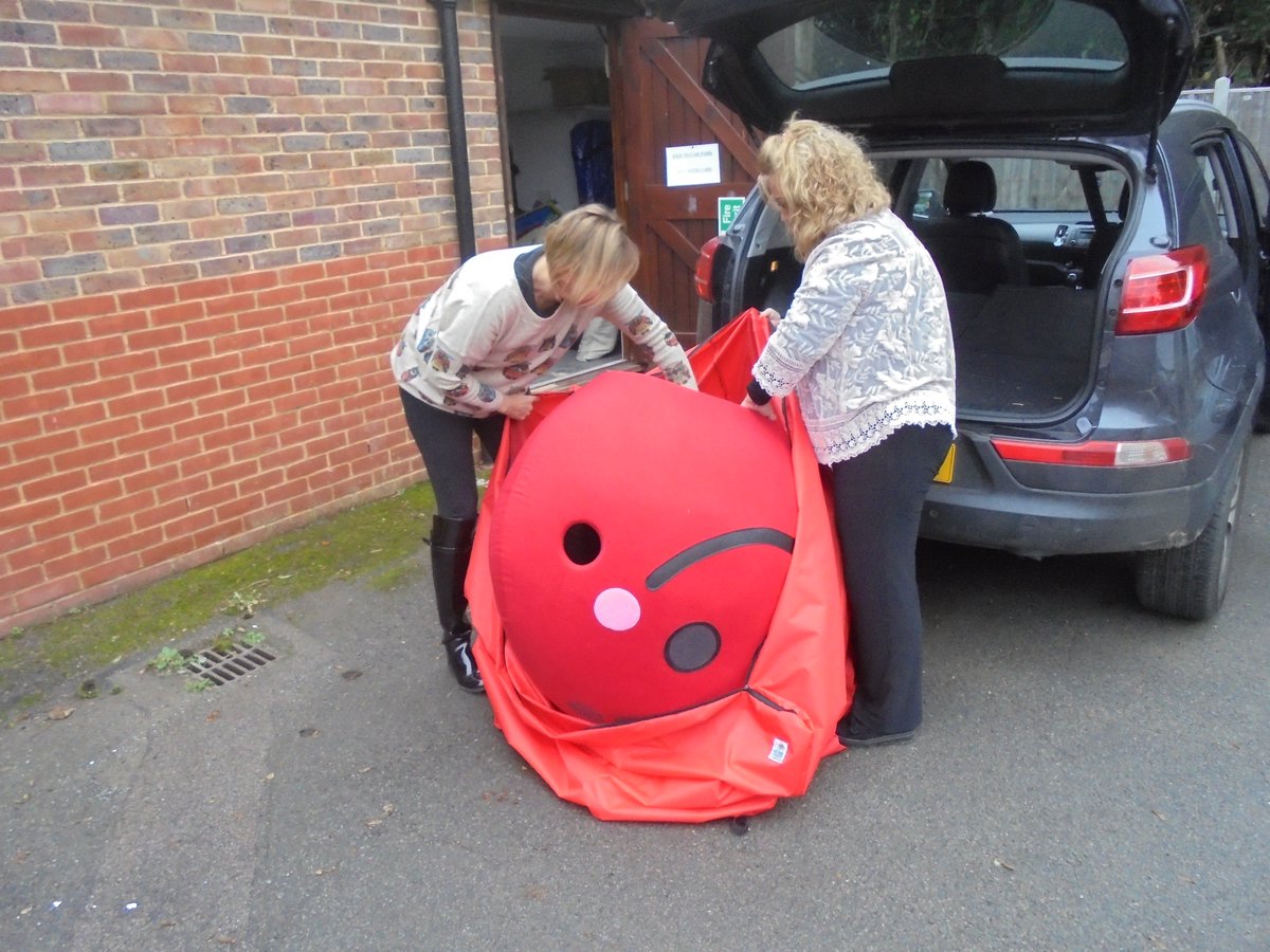 cherrytreesuk's tweet photo. Not the most dignified moment for our Mascot Cherry, but this is how she rolls... getting her out and ready for the photo shoot with @Mayor_Guildford Mike Parsons later tonight for the Christmas light switch on, Guildford High Street. 3,2,1 ..... ! #becherry @eagleradio https://t.co/NfInJgy6DU