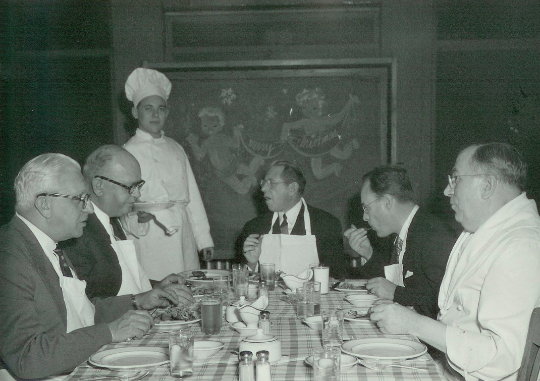CityTechAlumni's tweet photo. #tbt 1950's - The picture shows Benjamin Namm, chairman of the board of trustees at City Tech, and his board members enjoying a feast in Franklin Hall which is now known as Hospitality Management or the Namm building. #citytech #citytechalumni #cuny #holidayseason https://t.co/7cRN8RV1TJ