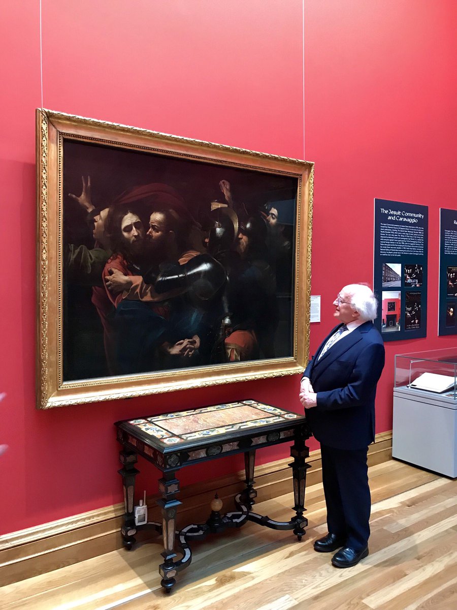 NGIreland's tweet photo. Delighted to welcome @PresidentIRL here today, to mark 25 years since the unveiling of Caravaggio’s The Taking of Christ. President Higgins was Minister for Arts, Culture &amp; the Gaeltacht at the time, and was present at the initial unveiling back in 1993! #caravaggio25 https://t.co/3WoTqPRD0t
