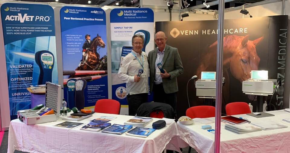 VennVeterinary's tweet photo. Hugh and J Mark Strong - Global Business Development Director at @MultiRadiance Veterinary showing us the powers of class 1 #lasertherapy and #shockwavetherapy #eswt @VetShow 💪🏻 
(🤔 should have ironed the table cloth 🤣)

#veterinary #veterinaryorthopaedics #veterinarian https://t.co/6LyyQEKegw