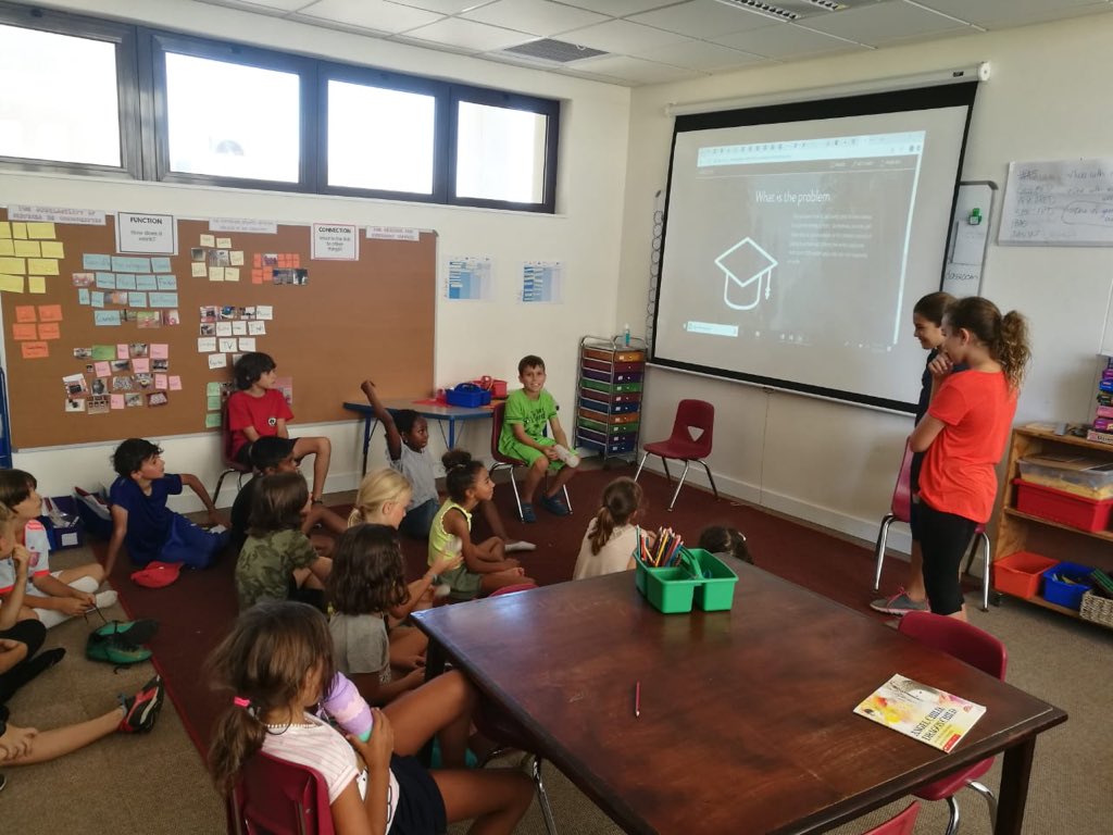 Two students in Grade 5 presenting a quality education action piece to our grade 3 learners today. They came back to their peers buzzing with excitement! <a href="/AISMmoz/">AISM</a> #agency <a href="/TeachSDGs/">#TeachSDGs</a> #AISMLearns
