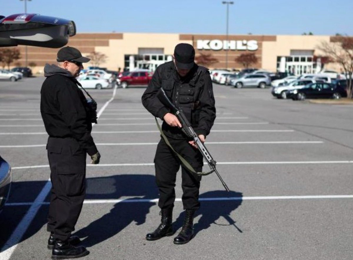 shannonrwatts's tweet photo. Actual Nazis are marching around a Kohls parking with semiautomatic rifles in Arkansas. Everything is fine. 

https://t.co/uPMfCg5uMo https://t.co/0oVc9rcka4