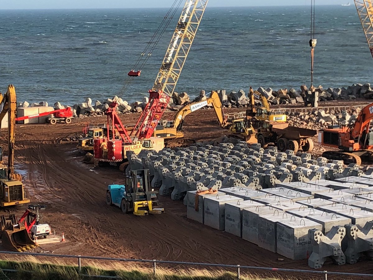 AshleyRdSchool's tweet image. P4-7 Stem Connections group learning about the Nigg Bay Harbour Expansion project. They were fascinated by the accropods- which are being made in Aberdeen! #stem #DYW #funatthebeach