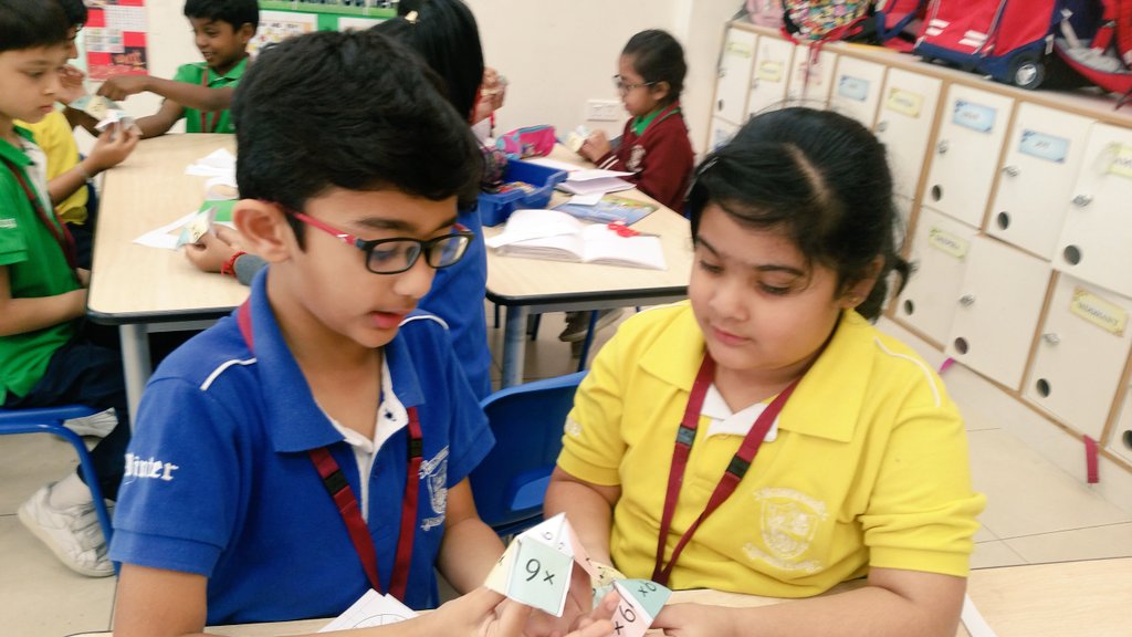 Gouri_Bhagwat's tweet photo. We didn't even realize mastering the multiplication facts playing with cootie catchers ~ #Cool2B #nmsprimary  #math @gemsnms_alkhail is so much fun~ @Fatima_Martin @ChristineDeNor1 @ShettySampoorna @Nahmiya15 https://t.co/1m1rFbPpXR