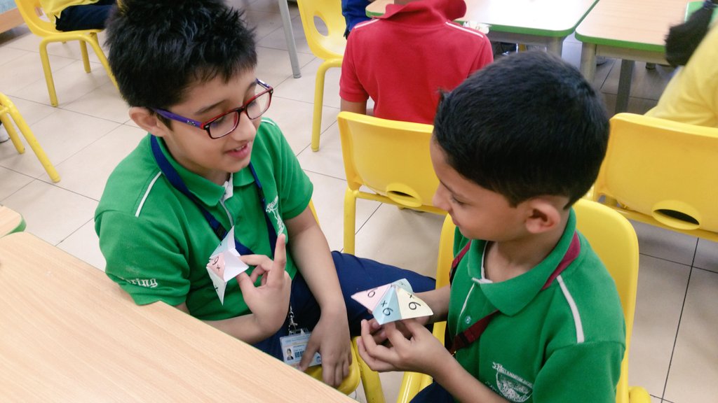 Gouri_Bhagwat's tweet photo. We didn't even realize mastering the multiplication facts playing with cootie catchers ~ #Cool2B #nmsprimary  #math @gemsnms_alkhail is so much fun~ @Fatima_Martin @ChristineDeNor1 @ShettySampoorna @Nahmiya15 https://t.co/1m1rFbPpXR