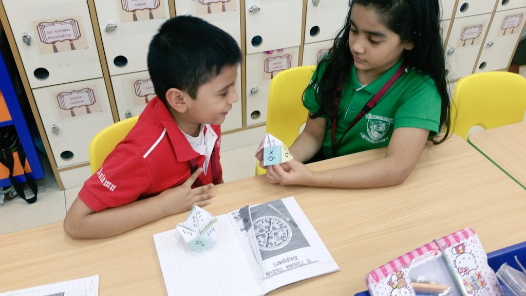 Gouri_Bhagwat's tweet photo. We didn't even realize mastering the multiplication facts playing with cootie catchers ~ #Cool2B #nmsprimary  #math @gemsnms_alkhail is so much fun~ @Fatima_Martin @ChristineDeNor1 @ShettySampoorna @Nahmiya15 https://t.co/1m1rFbPpXR