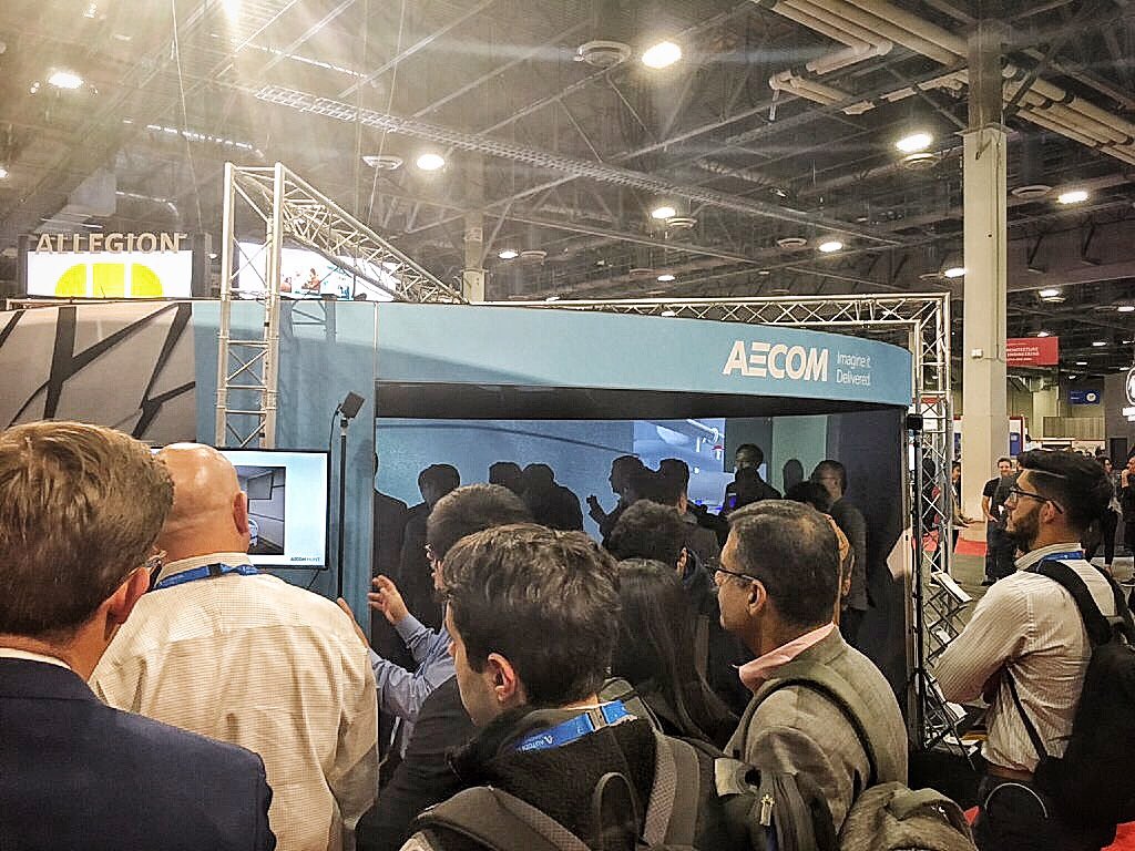 AECOM's tweet photo. We are showcasing some of our global projects and smart technology at #AU2018. In collaboration with @Igloovision, users are experiencing #sharedVR on projects like A303 Stonehenge, Mosul Dam and Serpentine Pavilion. #AECOM_AU2018 https://t.co/kNF6mD1UhA https://t.co/DchVvp4d8g