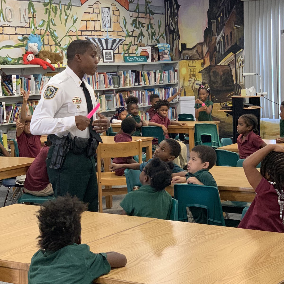 LockhartMagnet's tweet photo. Thank Officer Anthony Collins from #HCSO for his presentation on law enforcement! #BeLockhartSmart #BuildingHeartsBuildingMinds #WeClimbTogether @AchievementSch @SDHCMagnet https://t.co/8707dgsfsm