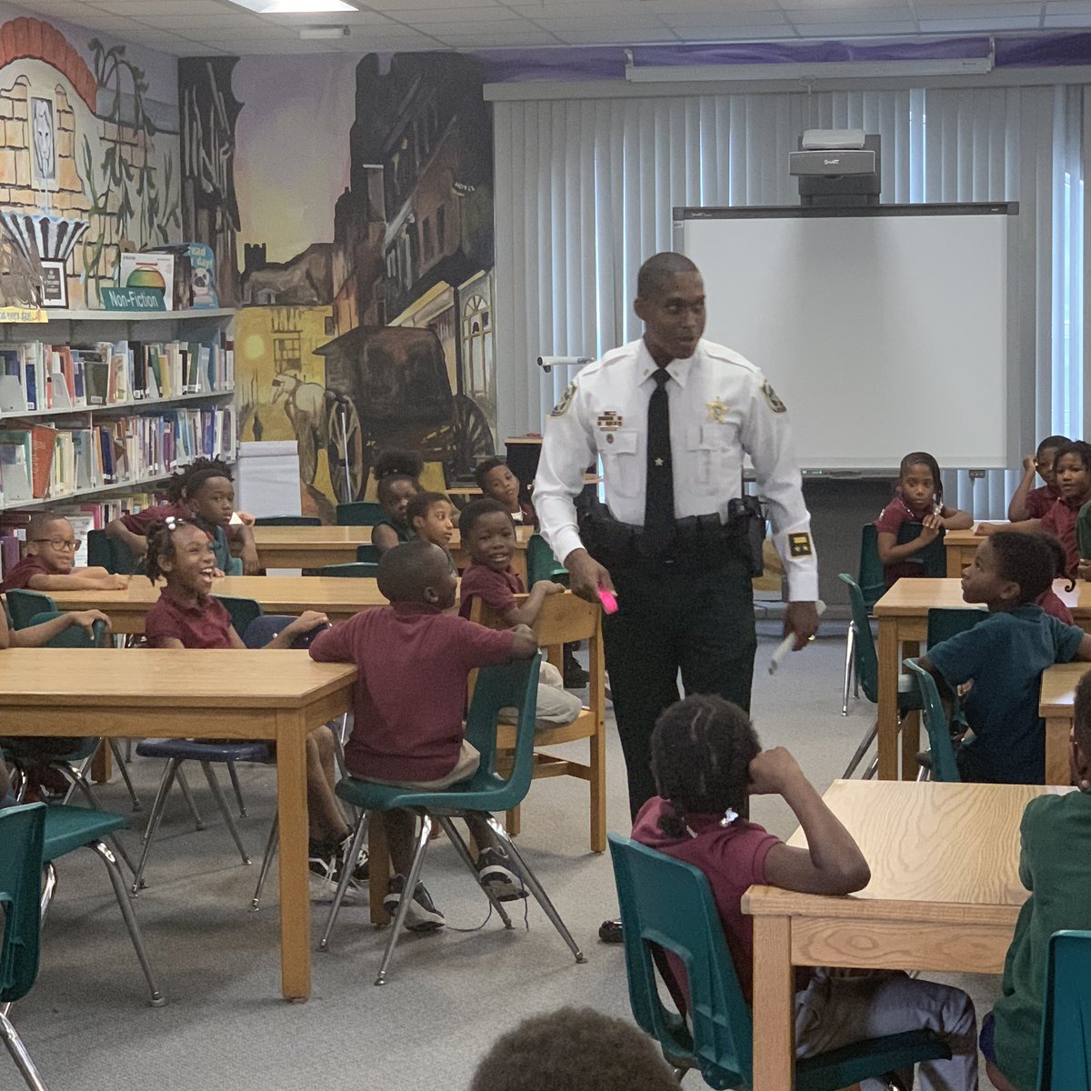 LockhartMagnet's tweet photo. Thank Officer Anthony Collins from #HCSO for his presentation on law enforcement! #BeLockhartSmart #BuildingHeartsBuildingMinds #WeClimbTogether @AchievementSch @SDHCMagnet https://t.co/8707dgsfsm
