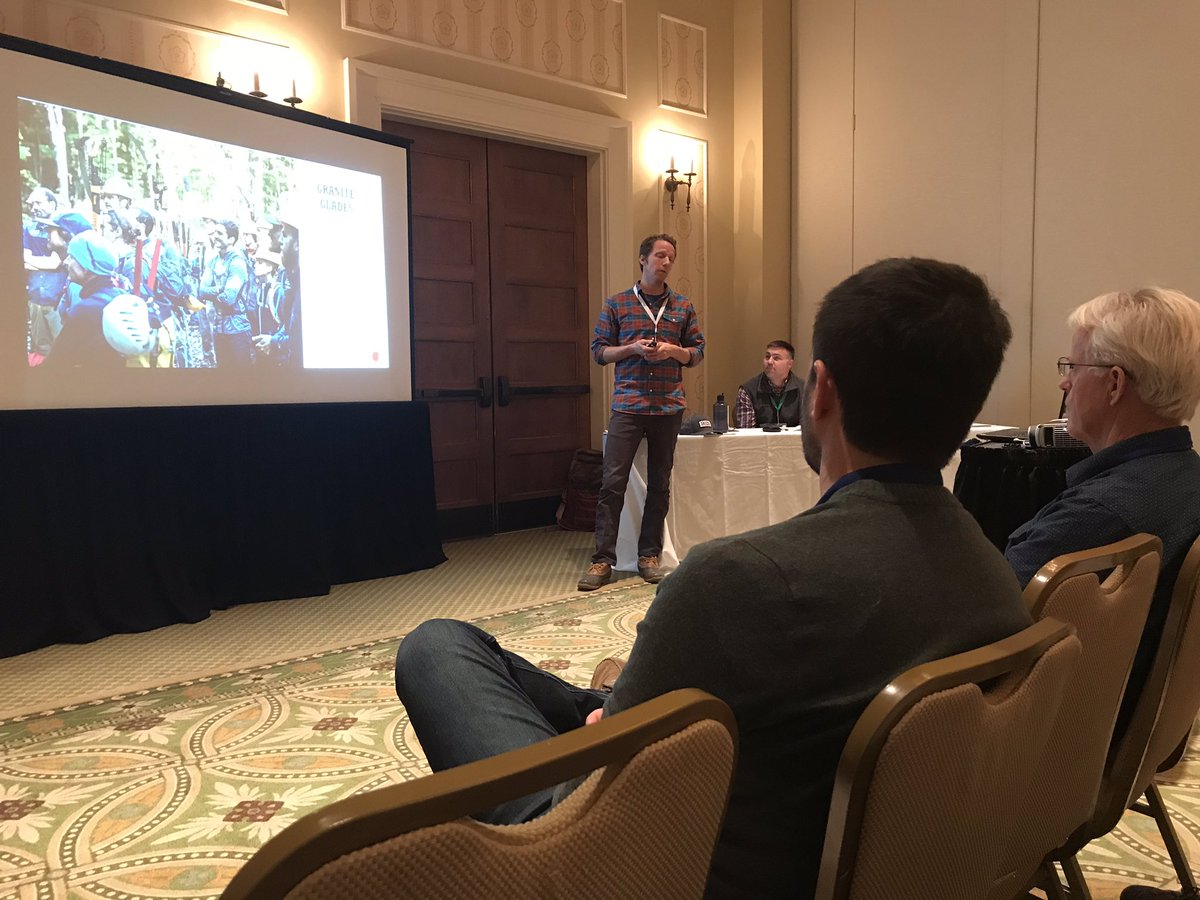 RocciAguirre's tweet photo. Listening to Tyler Ray from the Granite Backcountry Alliance talk about the challenges and benefits of backcountry ski trails at #NorthernForest2018. Folks from Adk Powder Skiers and BETA in the house.  #gladeskiing #backcountryskiing https://t.co/qJ2dJp9rbv