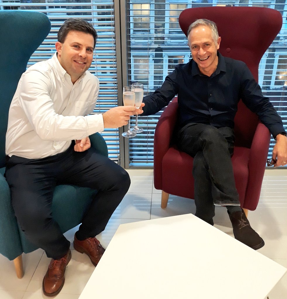 Posterscope's tweet photo. We're toasting 20 years to our Posterscope veterans Nick and Gav! #OOH #Original #20years #QubeCommunity https://t.co/N59pvoIhmn