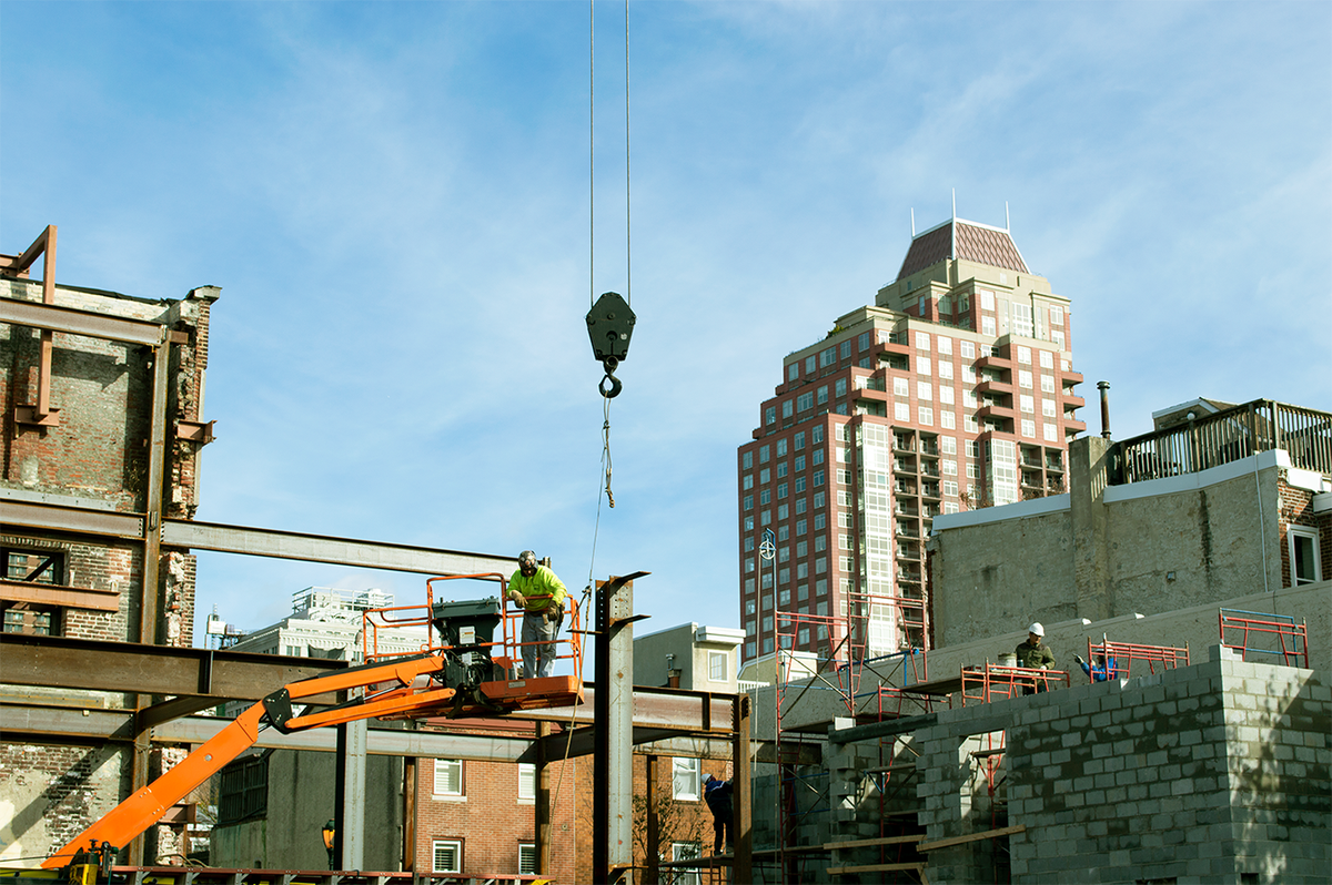 OCFRealty's tweet photo. We're beaming with excitement as crews install structural steel posts at The Royal Theater. #installationweek #ocfrealty https://t.co/MQddstKe9N