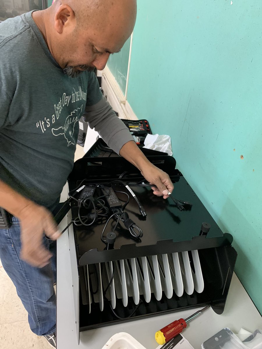 mjuareztech's tweet photo. Mr. Del toro is the jack of all trades he has been a huge help to the tech department @NataliaISD schools. Rolling out 155 @googlechrome books! #mustangnation https://t.co/j2cA55bPXe