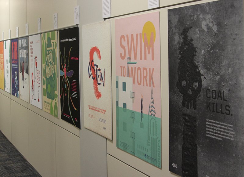 ArcD_KU's tweet photo. Impressive exhibit of #KUDesign student work on display now in Watson Library. Reception tonight at 5:00PM, 4th floor of Watson Library! @ArcD_KU @KUnews @kulibraries #design #advocacy #posters https://t.co/dyWnncusZU