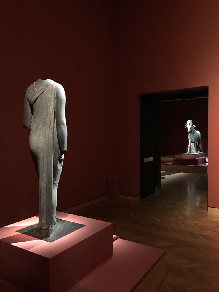 Amplify_Kate's tweet photo. As a visitor experience person in a #museum, my work space is all over (phones, lobby, etc). Today I collected audio guides, which meant my neighbors were these gorgeous #sunkencities statues. Plus, the VE office often has snacks, like these @GlamDollDonuts! #museum30 https://t.co/wVPnQ8UomF